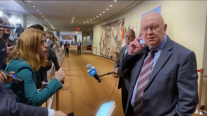 Russian ambassador to the UN turning away from a reporter