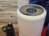 Air Purifier with a bottle next to it